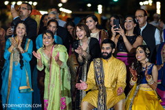 Indian bride and groom enjoying their sangeet celebration. Indian bride and groom enjoying their sangeet celebration.
