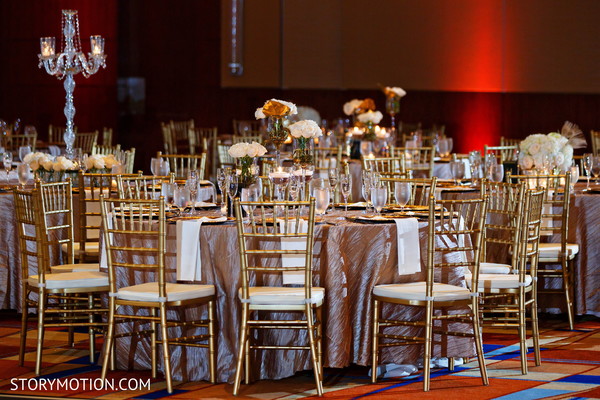 Dreamy Indian wedding reception table flower decoration.