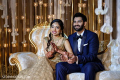 Indian bride and groom at their reception. Indian bride and groom at their reception.