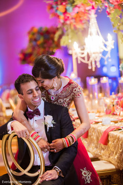 Charming Indian couple at reception photo session. Charming Indian couple at reception photo session.