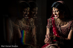 Gorgeous Indian bride smiling during the photo shoot Gorgeous Indian bride smiling during the photo shoot