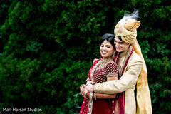 Indian groom hugging the Maharani Indian groom hugging the Maharani