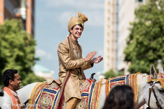 Happy indian groom riding baraat horse Happy indian groom riding baraat horse