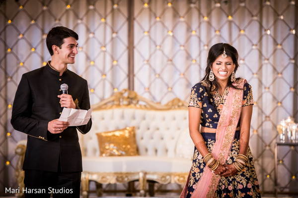 Indian groom delivering a message for the guests