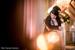 Indian groom hugging the Maharani Indian groom hugging the Maharani