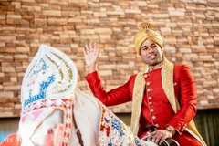 Charming Indian groom on his white baraat horse. Charming Indian groom on his white baraat horse.