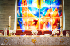 Incredible Indian christian altar flowers and candles decor. Incredible Indian christian altar flowers and candles decor.