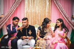 Indian couple getting food from wedding guests. Indian couple getting food from wedding guests.