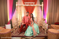 Lovely Indian couple at their sangeet stage. Lovely Indian couple at their sangeet stage.