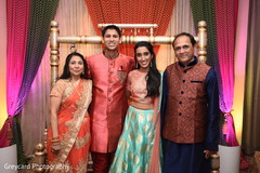 Indian bride and groom with parents photo. Indian bride and groom with parents photo.