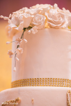 Indian wedding cake roses decorations capture. Indian wedding cake roses decorations capture.