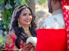 Indian bride sweetly looking at the groom Indian bride sweetly looking at the groom