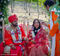 Joyful indian couple during their wedding ceremony Joyful indian couple during their wedding ceremony