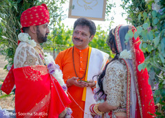 Indian couple during their wedding ceremony Indian couple during their wedding ceremony