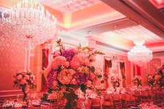 Incredible Indian wedding reception table flowers decor. Incredible Indian wedding reception table flowers decor.