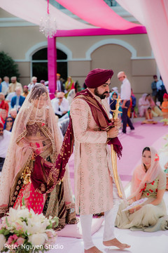 Indian groom holding the kirpan Indian groom holding the kirpan
