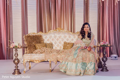 Indian bride posing for pictures during the reception Indian bride posing for pictures during the reception