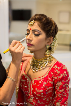 Indian bride being assisted by special guest Indian bride being assisted by special guest