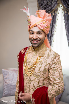 Indian groom smiling for cameras Indian groom smiling for cameras