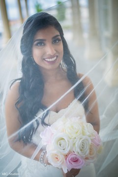 Indian bride on her white wedding dress. Indian bride on her white wedding dress.