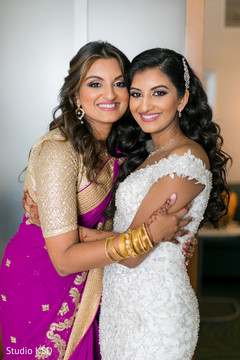 Lovely capture of Indian bridesmaid with bride. Lovely capture of Indian bridesmaid with bride.