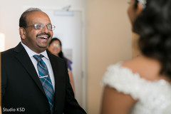 Joyful Indian father looking at maharani. Joyful Indian father looking at maharani.