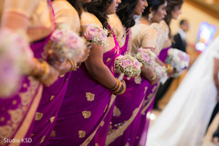 Indian bride with bridesmaids bouquets capture. Indian bride with bridesmaids bouquets capture.