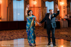 Ravishing Indian bridal parents making their entrance to reception. Ravishing Indian bridal parents making their entrance to reception.