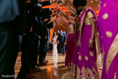 Indian newlyweds making their entrance to wedding reception Indian newlyweds making their entrance to wedding reception