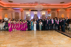 Indian couple with wedding guests photography. Indian couple with wedding guests photography.
