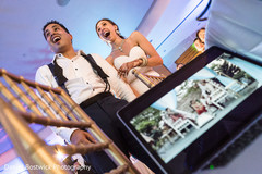 Indian couple looking at their video Indian couple looking at their video