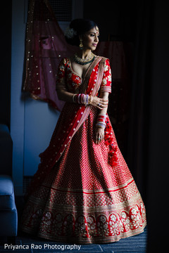 Indian bride posing with her glamorous lengha Indian bride posing with her glamorous lengha