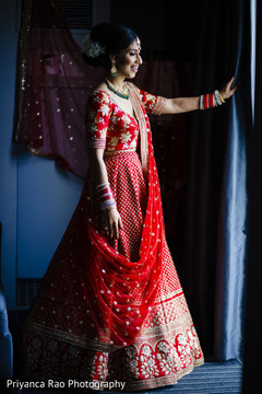 Detail of the Indian bride posing with lengha Detail of the Indian bride posing with lengha