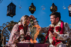 Maharani and Raja during the rituals Maharani and Raja during the rituals