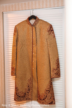 Colorful sherwani in the hanger Colorful sherwani in the hanger