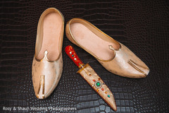Shoes and kirpan of Indian groom Shoes and kirpan of Indian groom