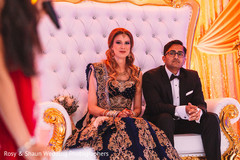 Indian couple listening to a speech Indian couple listening to a speech