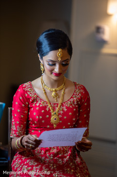 Indian bridal capture reading a letter. Indian bridal capture reading a letter.