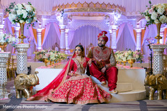 Glamorous indian couple posing at mandap. Glamorous indian couple posing at mandap.