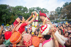 Maharani putting garland to groom at baraat. Maharani putting garland to groom at baraat.