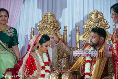 Indian couple at their Sindoor wedding ritual. Indian couple at their Sindoor wedding ritual.