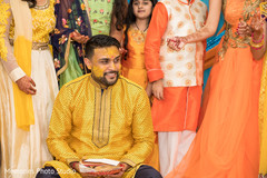 Charming groom at haldi party capture. Charming groom at haldi party capture.
