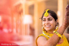 Joyful Indian bride at the Mehndi celebration. Joyful Indian bride at the Mehndi celebration.