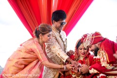 Kanyadaan ritual where Indian couple are holding leaf with parents . Kanyadaan ritual where Indian couple are holding leaf with parents .