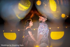 Adorable Indian bride and groom face to face outdoor portrait. Adorable Indian bride and groom face to face outdoor portrait.