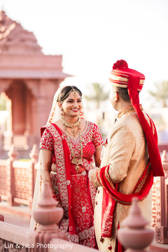 Cute Indian bride and groom's first look capture. Cute Indian bride and groom's first look capture.