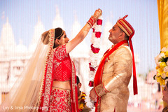 Maharani putting garland to rajah at wedding ceremony. Maharani putting garland to rajah at wedding ceremony.