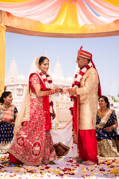 Indian bride putting ring to groom. Indian bride putting ring to groom.