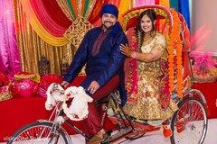 Maharani and Raja riding the bike Maharani and Raja riding the bike