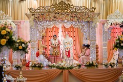 Indian newlyweds under the mandap Indian newlyweds under the mandap